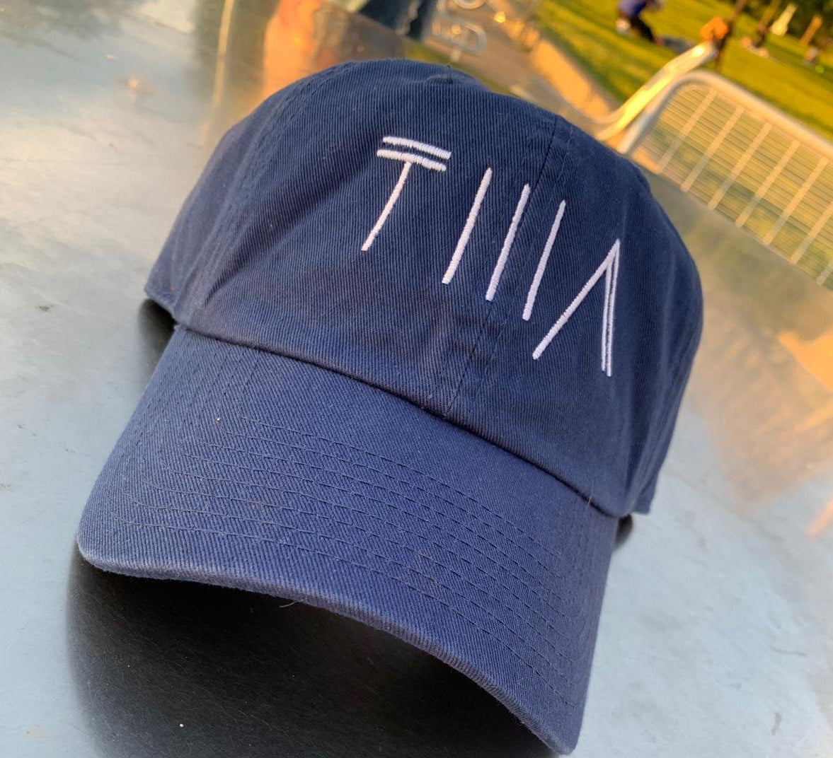 T I I I A Hat